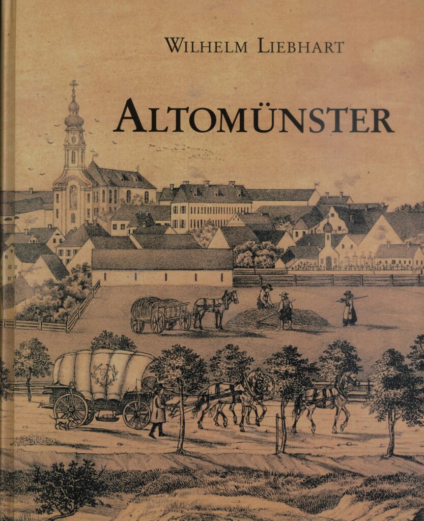 Ein Bücherkiosk mit bunten Bucheinbänden im Park.