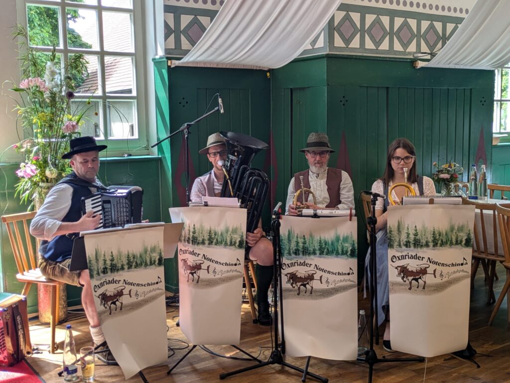 Four musicians performing